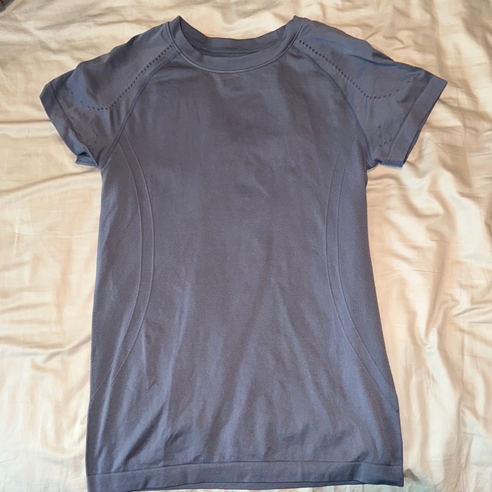 Two athletic shirts size large